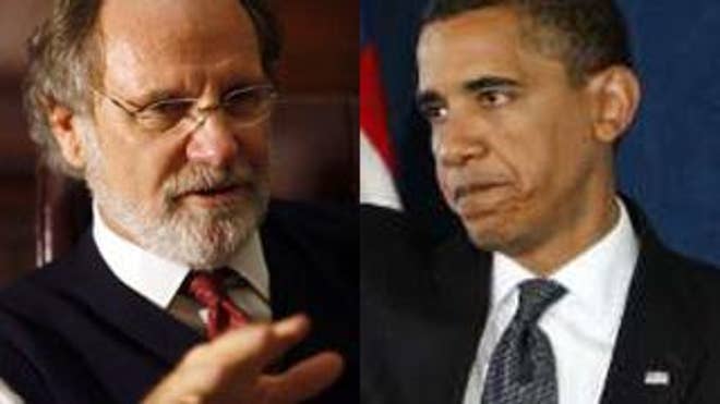 President Obama is campaigning for New Jersey Gov. Jon Corzine, who polls show is behind in his re-election race. (Reuters Photos)