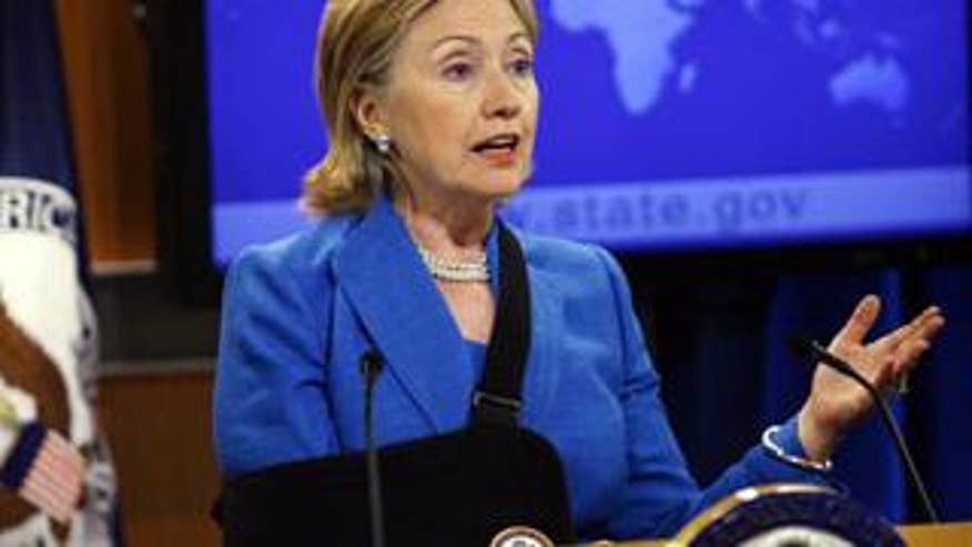 Secretary of State Hillary Clinton speaks to reporters after meeting with ousted Honduran President Manuel Zelaya in Washington on Tuesday. (AP Photo)