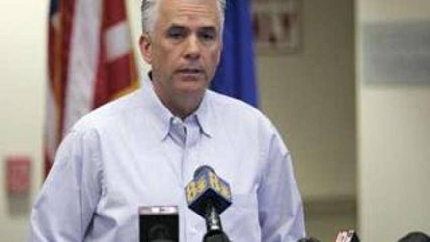 Sen. John Ensign speaks to reporters in Las Vegas on June 16 about an affair he had with a former staffer. (Reuters Photo)