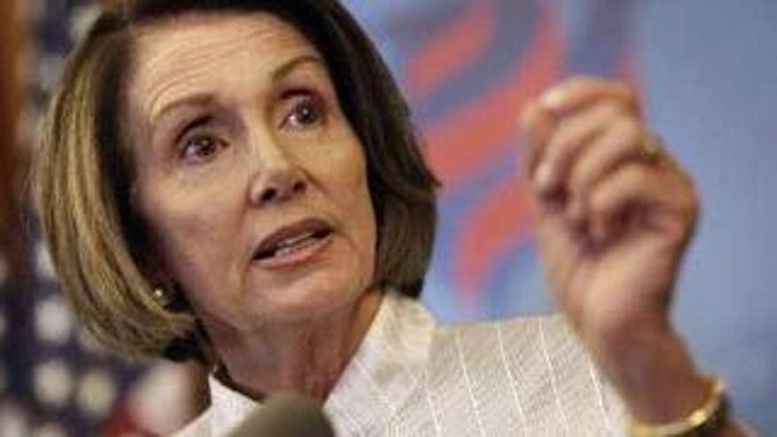 House Speaker Nancy Pelosi gestures during a news conference Wednesday in Washington. (Reuters Photo)