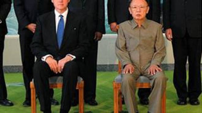 Former President Bill Clinton meets with North Korean leader Kim Jong Il in Pyongyang on Tuesday. (AP Photo/Korean Central News Agency via Korea News Service)