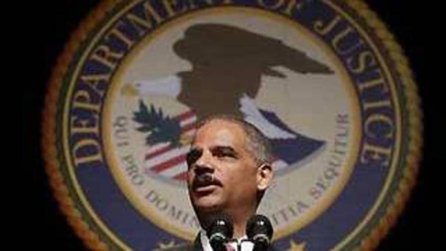 Attorney General Eric Holder speaks at his ceremonial installation in Washington March 27. (Reuters Photo)