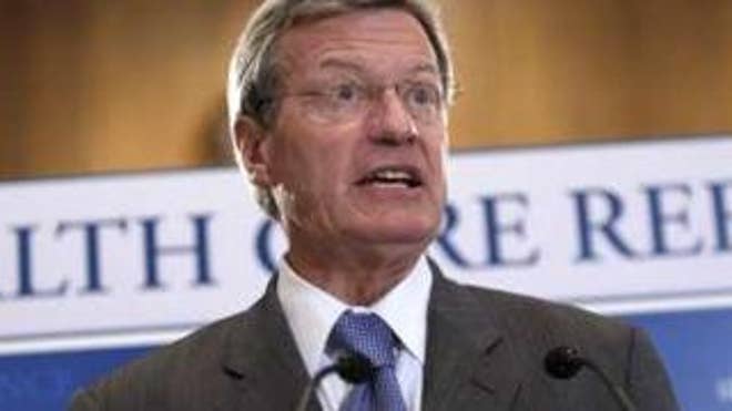 Sen. Max Baucus discusses the health care reform bill during a news conference on Capitol Hill Sept. 16. (Reuters Photo)