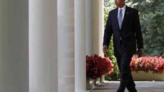 President Obama walks out to the Rose Garden last Tuesday in Washington. (Reuters Photo)