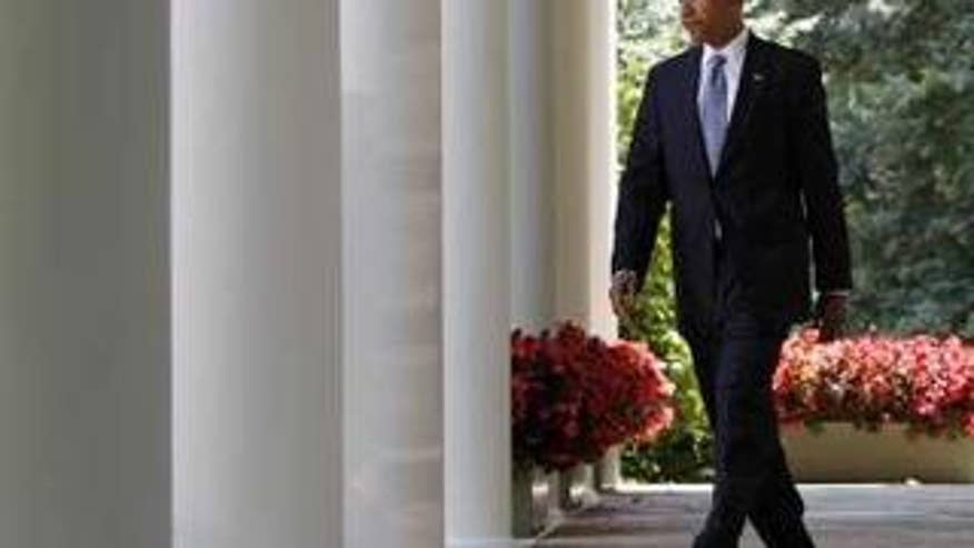 President Obama walks out to the Rose Garden last Tuesday in Washington. (Reuters Photo)
