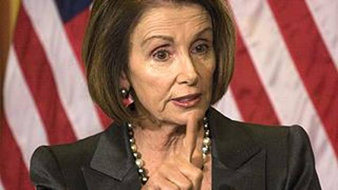 Pelosi gestures in DC