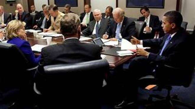 President Obama discusses Afghanistan with his national security team in Washington Sept. 30. (White House)