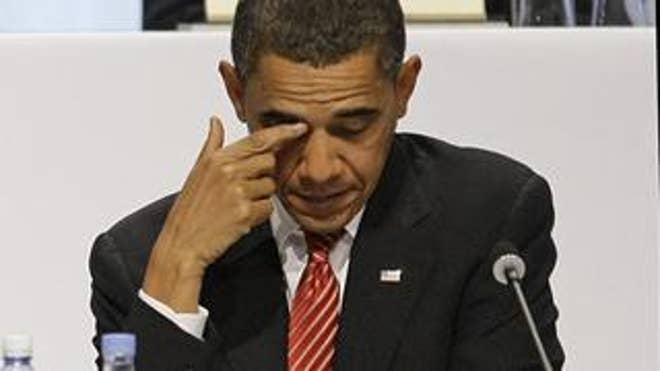President Barack Obama pauses during the Chicago 2016 bid presentation