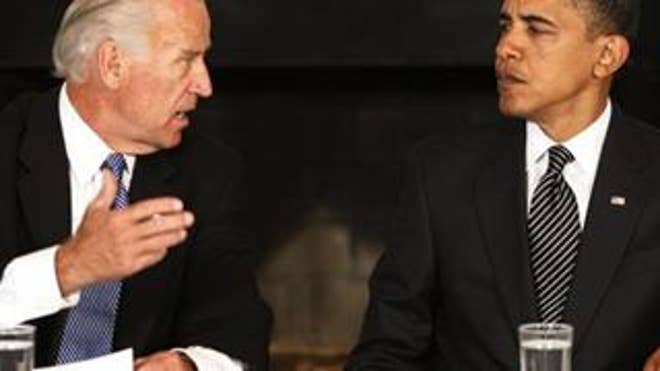In this June 8 file photo, Vice President Biden talks to President Obama at a Cabinet meeting at the White House. (AP Photo)