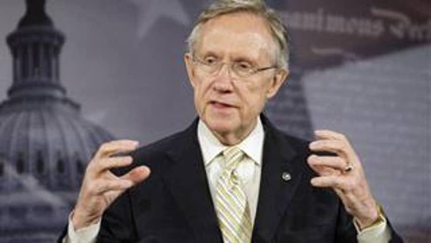 Senate Majority Leader Harry Reid speaks on health care reform at a news conference Oct. 26 in Washington. (AP Photo)