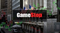 GameStop shares sink after company update on business, plans stock sale