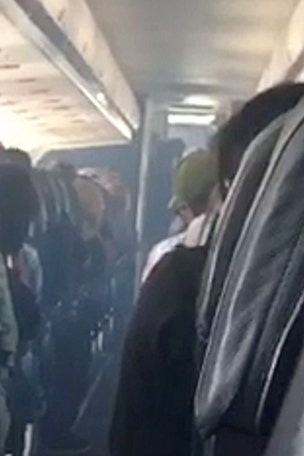 Vid shows flight filling with smoke