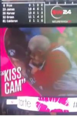 Couple's 'Kiss Cam' smooch goes viral