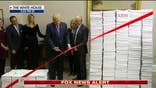 'Draining the swamp': Trump literally cuts red tape, touts historic regulatory reform