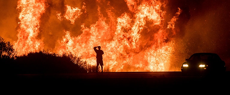 200,000 Californians flee homes as wind whips wildfires closer to LA