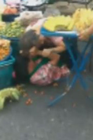 Elderly women filmed fighting over fruit