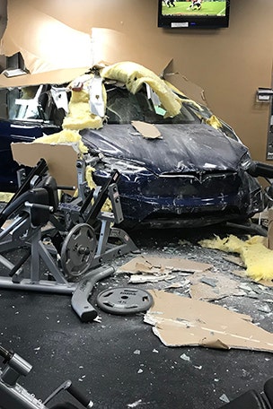Watch: Tesla crashes into gym