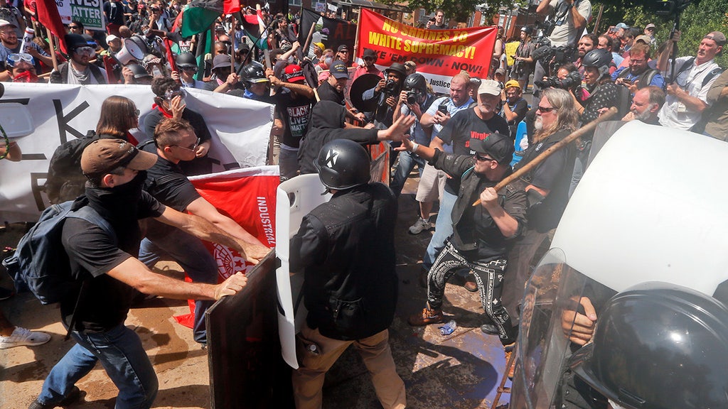 'Unite the Right' ralliers banned by Uber, restaurants; Twitter suspends accounts