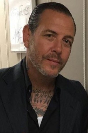 Rocker beat up, spat on Trump supporter?