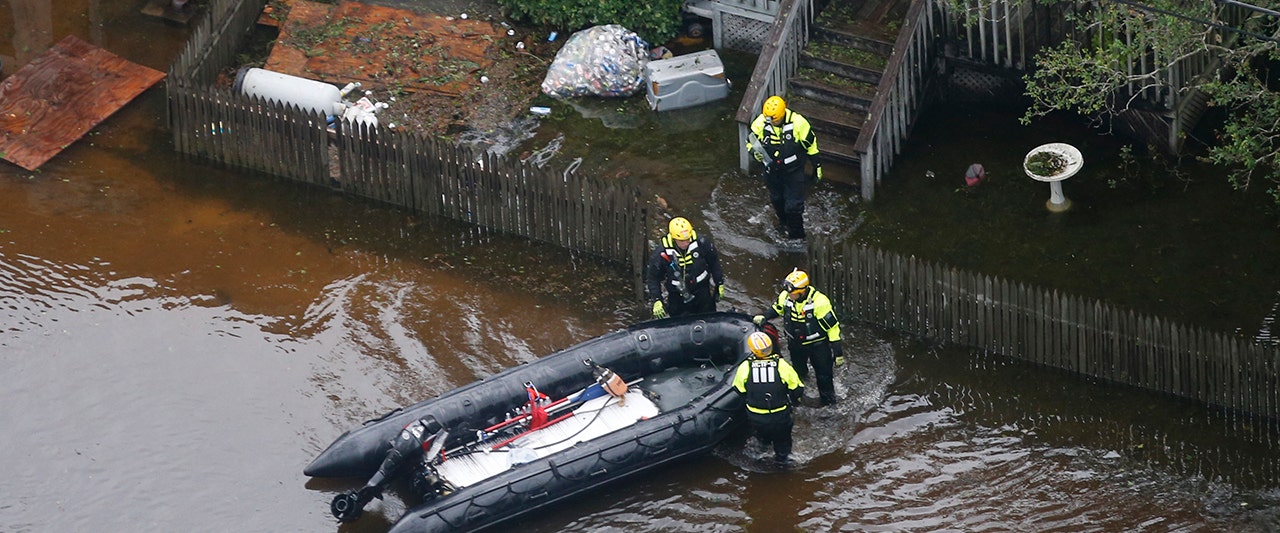Tropical Storm Florence's death toll climbs to at least 11 as rainfall continues to drench Carolinas