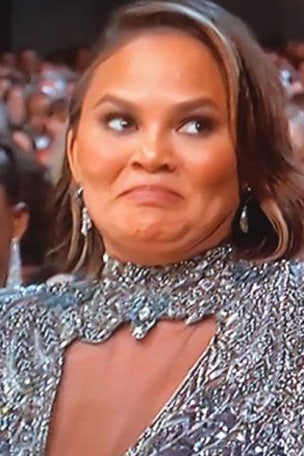 Teigen cringes at Emmy joke