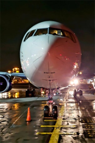 Police: Flight landed 'heavy,' blew tires
