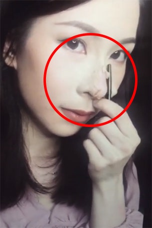 Women remove 'noses' in shocking vids