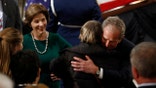 George W. Bush, Jeb Bush greet mourners paying tribute to George H.W. Bush at Capitol