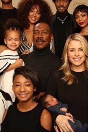 Murphy poses with all 10 children