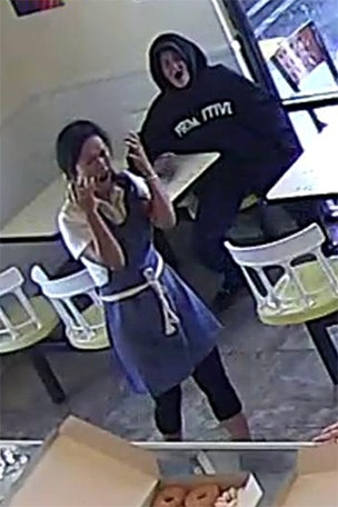 Shop owner attacked with coffee in scary vid