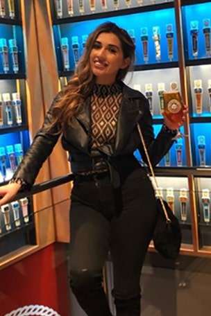 Yes, you can drink a beer there