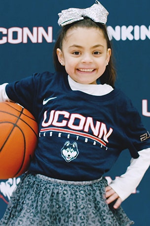 UConn's 'tiniest Husky' inspires team
