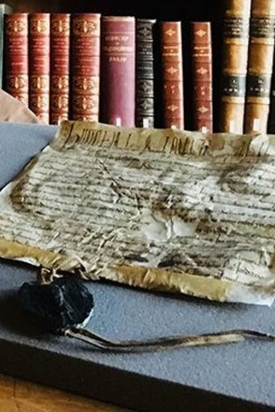 800-year-old royal charter discovered inside WHAT?