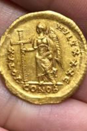 1,600 year-old coin discovered by WHO?