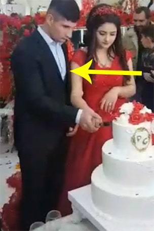 WATCH: Groom LOSES IT during cake-cutting