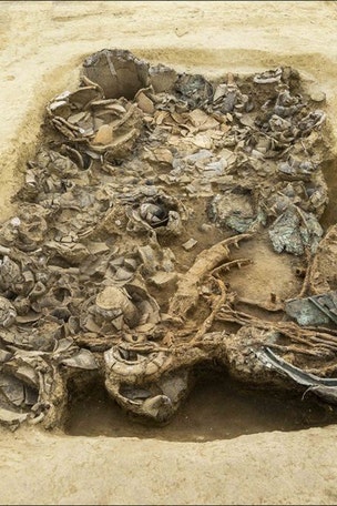 Mysterious Iron Age tomb contains WHAT?