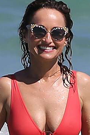 Giada, 49, STUNS in red swimsuit