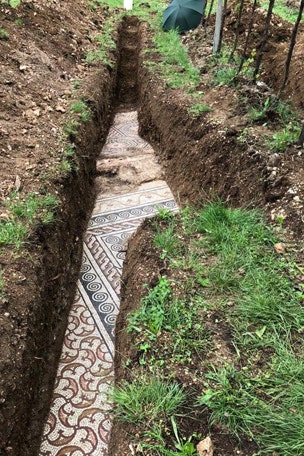 Ancient floor discovered WHERE?