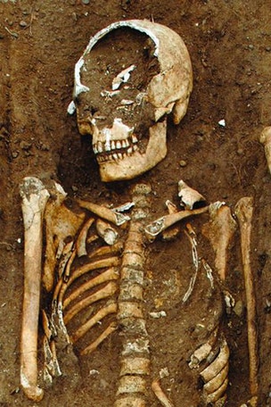 Ancient children have WHAT in their mouths?
