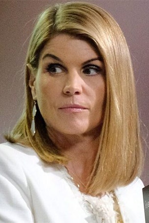 Loughlin TURNS herself in