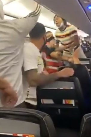 SEE IT: Fists fly on Spirit flight