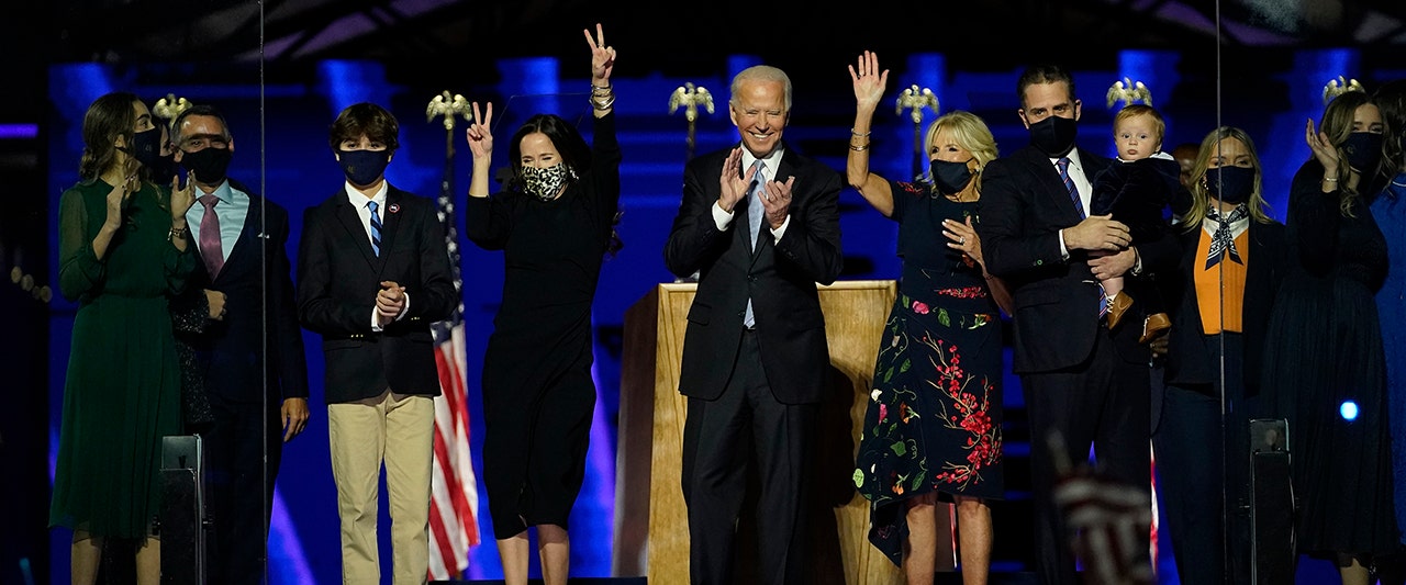 WHole Biden gang, Biden holding kid