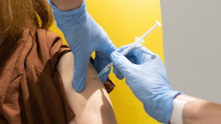 Medical experts wants patients to know side effects from first dose of COVID-19 vaccine 'will not be a walk in the park'