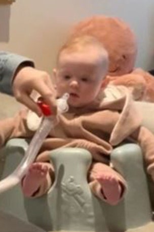 SEE IT: Dad's TRICK for feeding baby
