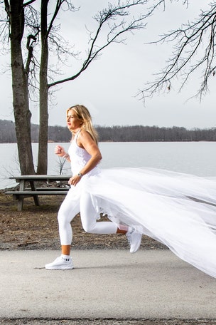 Runner wears WEDDING dress