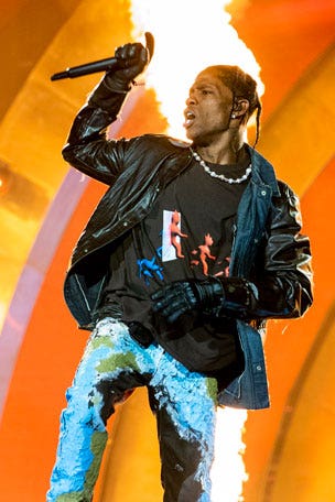 Travis Scott HELPS fan in new video