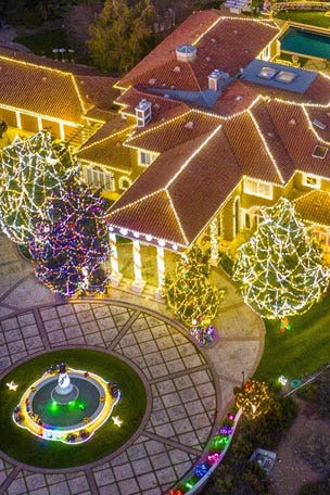 Celebrities show off MASSIVE Christmas displays