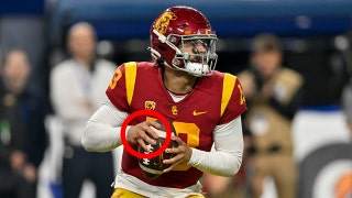 Opposing team trolls college QB who wrote profane message on body