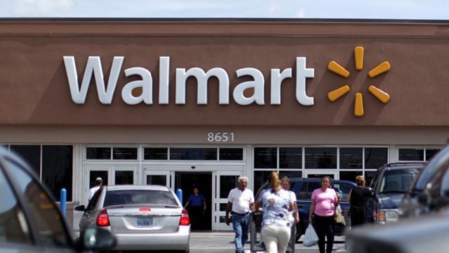 Wal-Mart shares hit new high