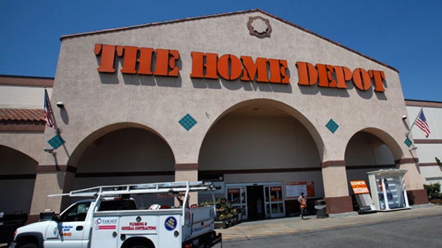 Wal-Mart, Home Depot shares hit new highs